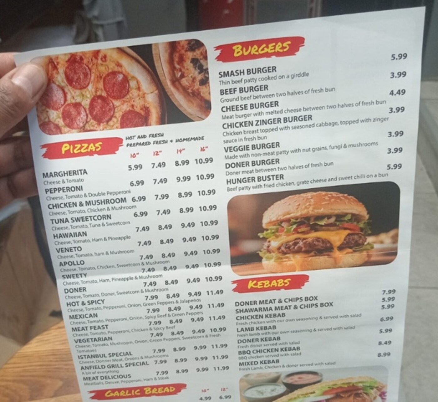 Anfield Grill and Pizza House menu featuring freshly prepared pizza and burgers
